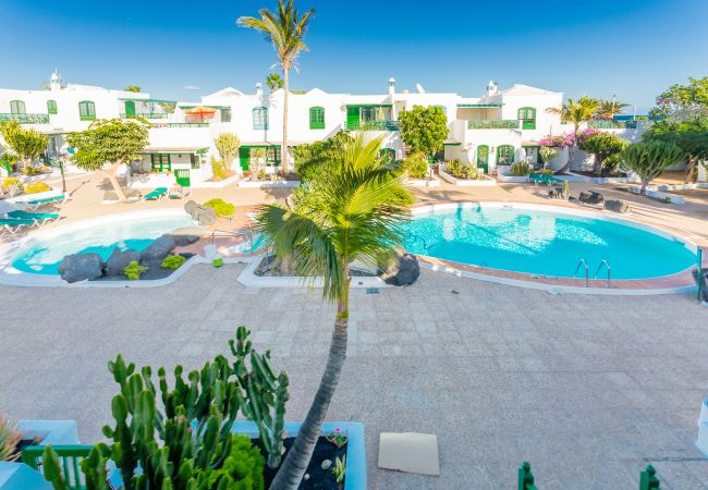 Апартаменты на Пуэрто дель Кармен - Nautic Apartment Playa Grande, con Terraza, Piscina Compartida y a solo 150m de la Playa