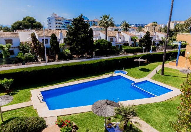 Appartement à Javea - Menorca Duplex Javea, avec terrasse, piscine communautaire et très proche de la plage