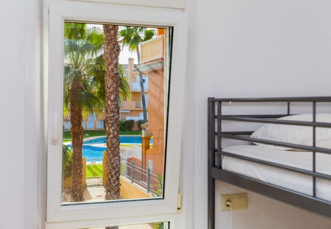 Appartement à Javea - La Romana Triplex Apartment Javea Arenal, avec Terrasse, Climatisation, Piscine, Jardin, Tennis