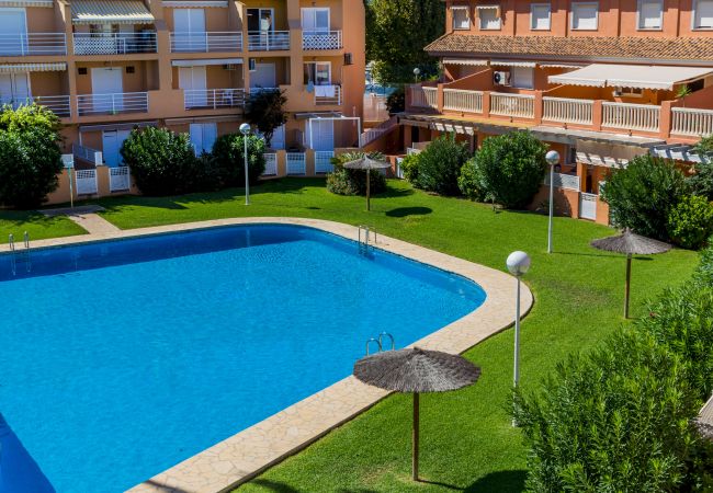 Appartement à Javea - La Romana Triplex Apartment Javea Arenal, avec Terrasse, Climatisation, Piscine, Jardin, Tennis