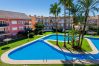 Appartement à Javea - La Romana Triplex Apartment Javea Arenal, avec Terrasse, Climatisation, Piscine, Jardin, Tennis